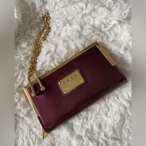 bebe Maroon Patent Leather Wristlet with Gold Hardware